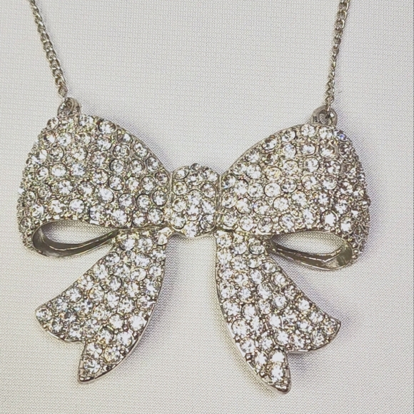 Fashion Forward Large Rhinestone and Silver Bow Pendant Necklace - Picture 9 of 11